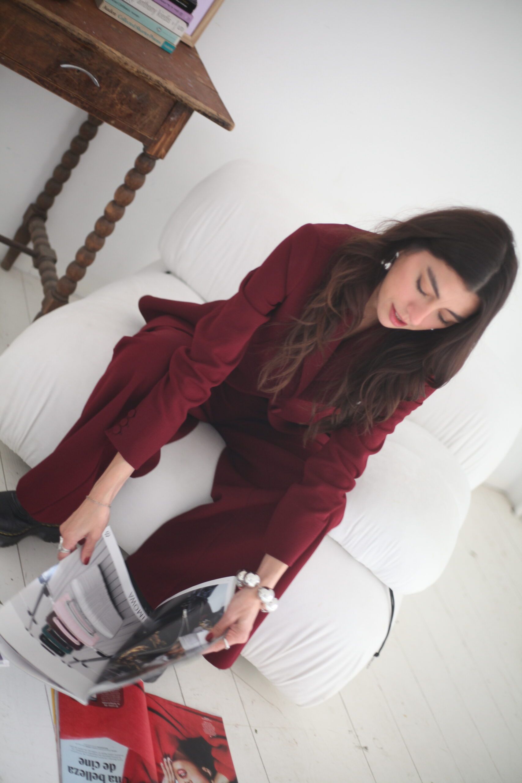 self image looking over magazines